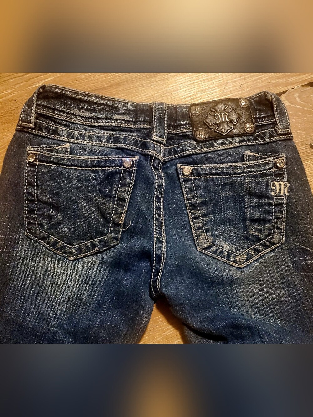 Miss Me Dark Blue Low Rise Boot Cut Distressed Back Pocket Jeans